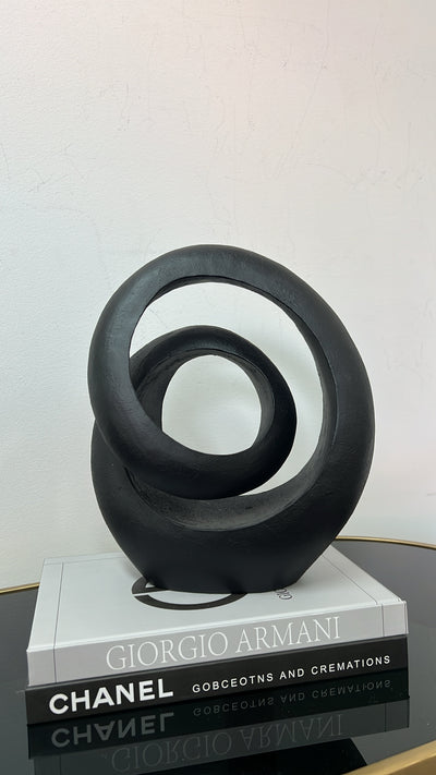 Black loop abstract sculpture