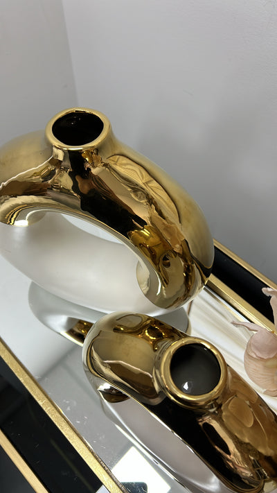 White and gold round vase