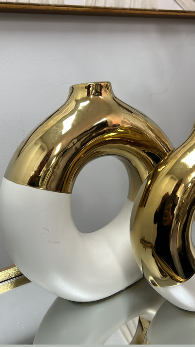 White and gold round vase