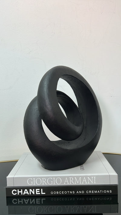 Black loop abstract sculpture