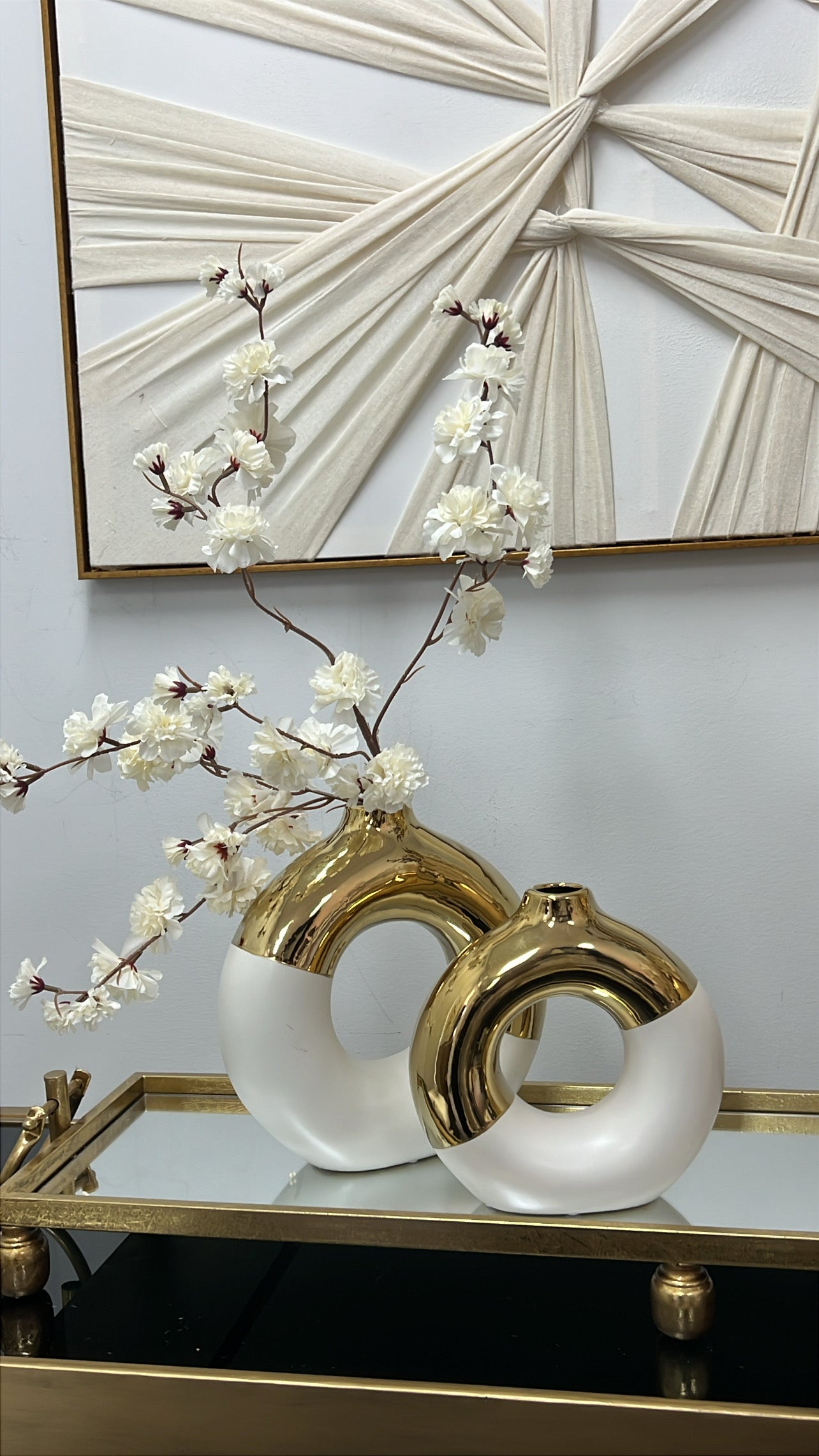 White and gold round vase
