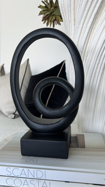 Black loop sculpture abstract