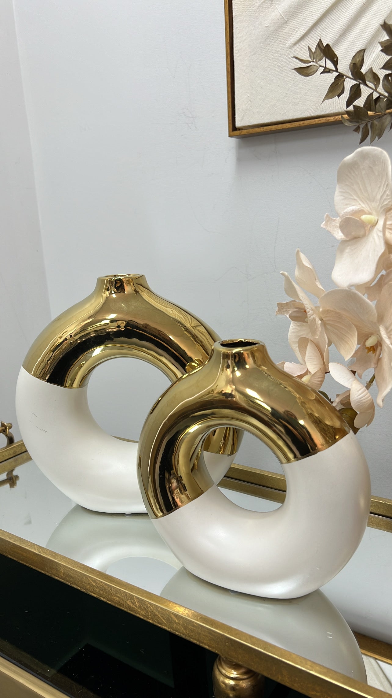 White and gold round vase