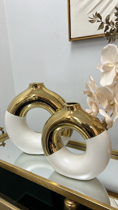 White and gold round vase