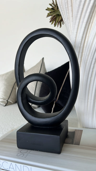 Black loop sculpture abstract