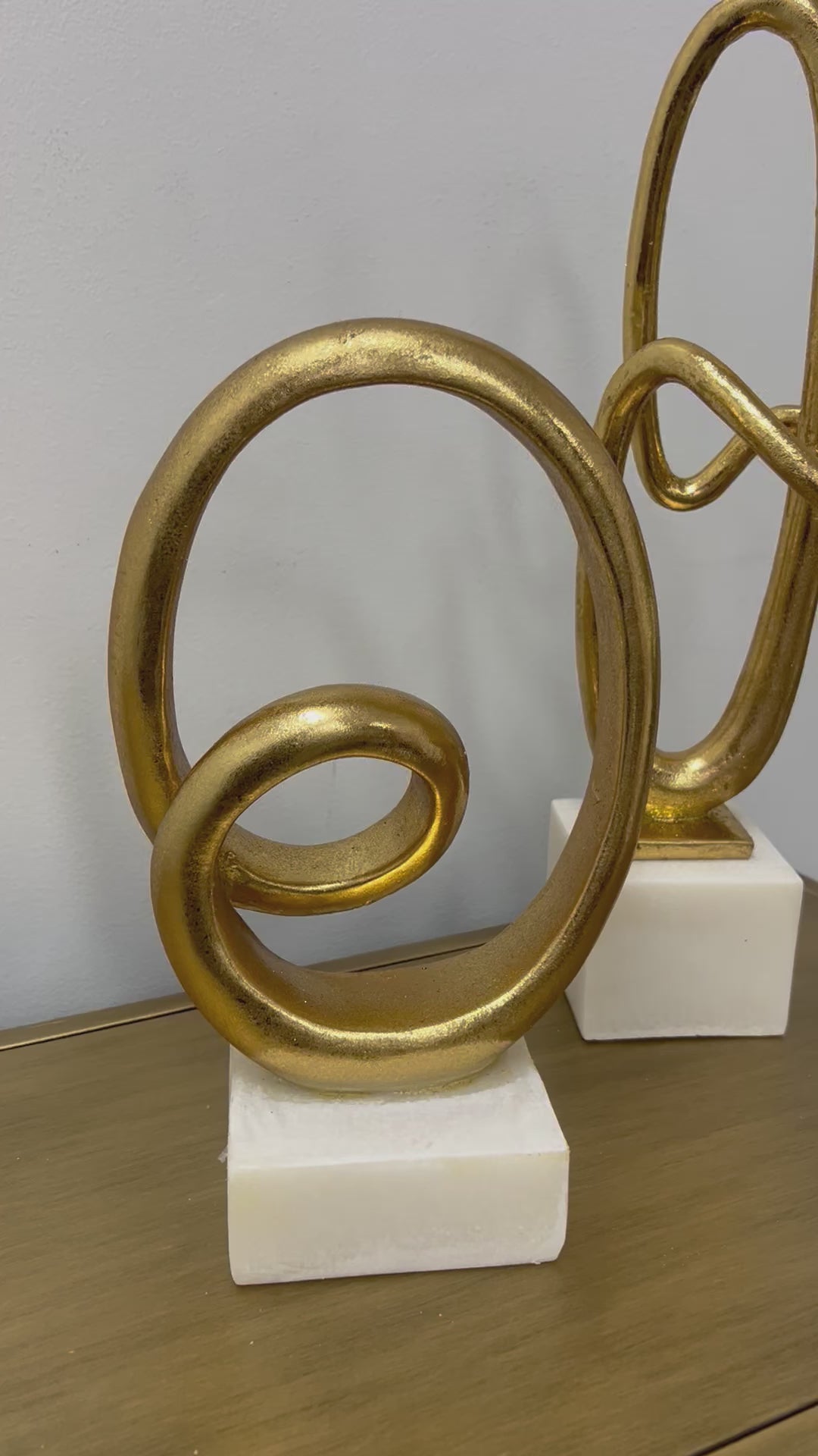 Loop Gold sculpture statue